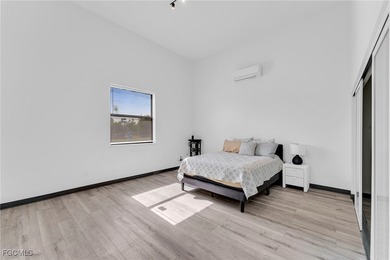 This stunning 3-bedroom, 3-bath contemporary Gulf access home