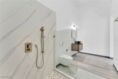 This stunning 3-bedroom, 3-bath contemporary Gulf access home