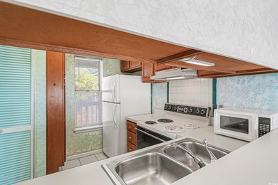 Discover easy coastal living in this beautifully maintained