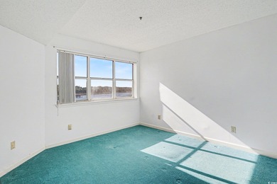 Discover easy coastal living in this beautifully maintained