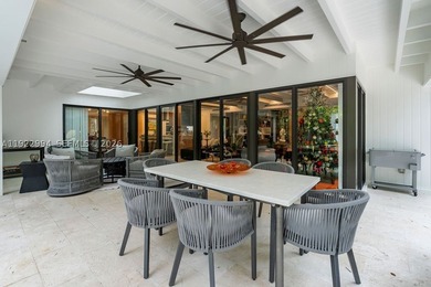 Experience a modern South Coconut Grove residence that perfectly - photo 11