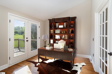 Located in the sought-after Smithfields golf community, this