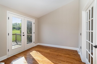 Located in the sought-after Smithfields golf community, this