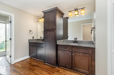 Located in the sought-after Smithfields golf community, this