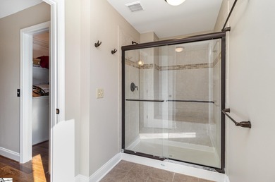 Located in the sought-after Smithfields golf community, this