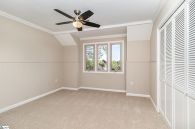 Located in the sought-after Smithfields golf community, this