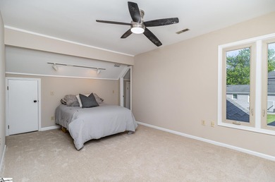 Located in the sought-after Smithfields golf community, this