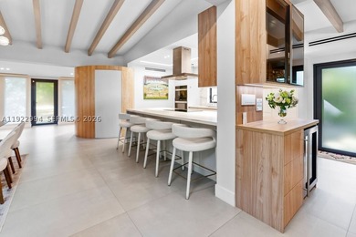 Experience a modern South Coconut Grove residence that perfectly - photo 21