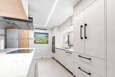Experience a modern South Coconut Grove residence that perfectly - photo 23
