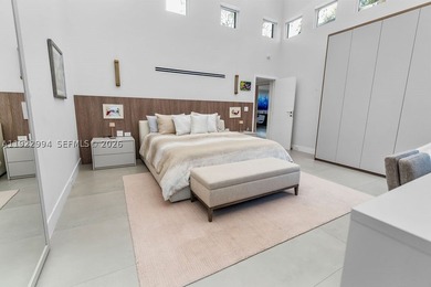 Experience a modern South Coconut Grove residence that perfectly - photo 28