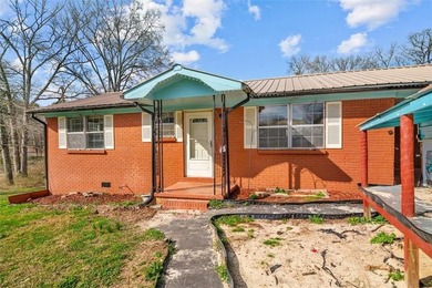 Nestled in a quiet, established neighborhood, this classic