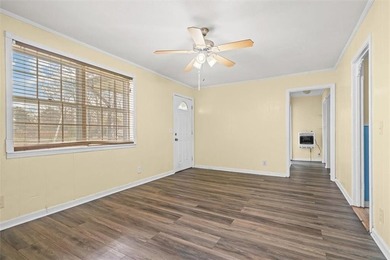 Nestled in a quiet, established neighborhood, this classic