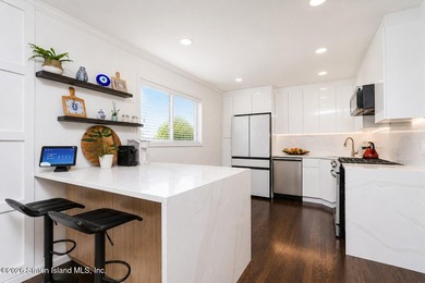 Welcome to this beautifully updated single-family townhouse in - photo 18