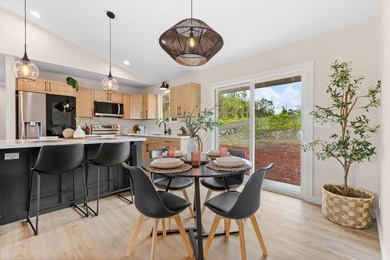 Discover modern island living in this brand new 3 bedroom, 2 - photo 1
