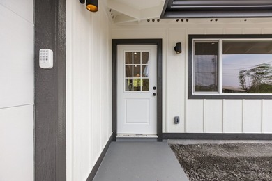Discover modern island living in this brand new 3 bedroom, 2 - photo 3