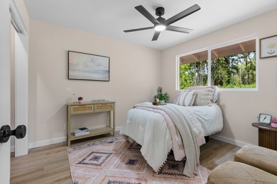 Discover modern island living in this brand new 3 bedroom, 2 - photo 6