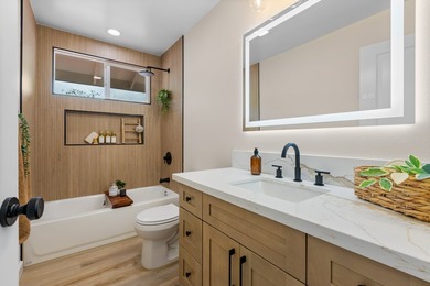 Discover modern island living in this brand new 3 bedroom, 2 - photo 8