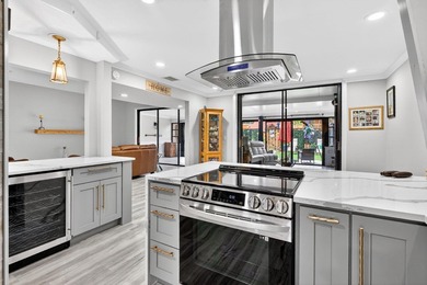 Step into luxury living in this beautifully renovated - photo 1