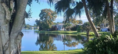 Spacious 2/2 with fabulous lake views and an open airy floor - photo 5