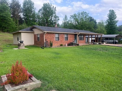 Tucked into 8 rolling acres of peaceful countryside, this fully - photo 1
