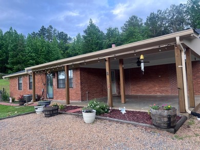 Tucked into 8 rolling acres of peaceful countryside, this fully - photo 2