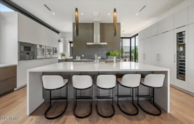 Stunning modern home in gated Azure, Paradise Valley. Ideally