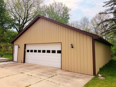 Rare find in Manitou Beach: dedicated pontoon boat garage behind - photo 16