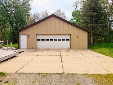 Rare find in Manitou Beach: dedicated pontoon boat garage behind - photo 18