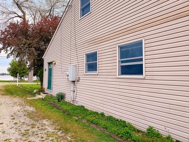 Rare find in Manitou Beach: dedicated pontoon boat garage behind - photo 20