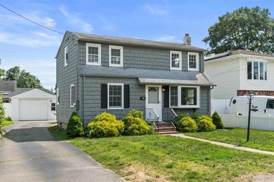 Welcome to This Beautifully Renovated 4-Bedroom, 2 Bath Expanded - photo 1