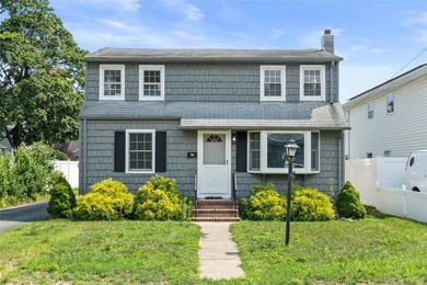 Welcome to This Beautifully Renovated 4-Bedroom, 2 Bath Expanded - photo 2