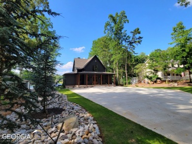 This craftsman style lakefront home is conveniently located in - Lake Home Off Market in Eatonton, Georgia