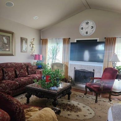 This custom built home with a circular driveway sits in a well - photo 6
