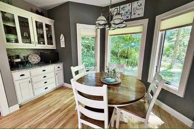 Listed at $549,900, this stunning 4+ bedroom, 4-bath acreage - photo 8