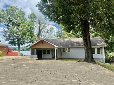 This waterfront home sits on Pickwick Lake. With 119 ft of - photo 1