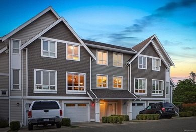 This three-story townhome is a fantastic opportunity to own in a - photo 1