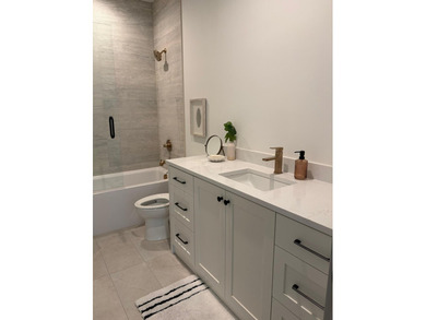 Welcome to this stunning luxury townhome that masterfully blends - photo 11