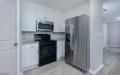 Welcome to this beautifully maintained 4-BEDROOM 3-BATH PLUS DEN - photo 8