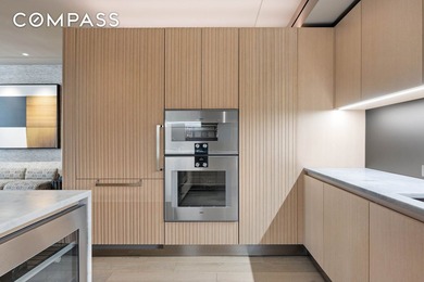 Enjoy the ultimate downtown lifestyle in this artfully-crafted 2 - photo 8