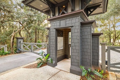 This exceptional 0.33-acre homesite offers bay views within the - photo 15