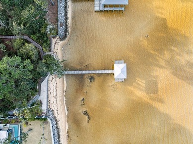 This exceptional 0.33-acre homesite offers bay views within the - photo 19