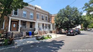This Multi Family Style Home Features 5 Bedrooms, 2 Full Baths & - photo 1