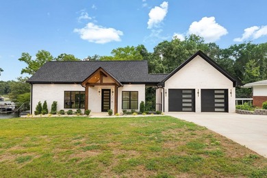 This new construction modern lake home is so fresh the walls - photo 2