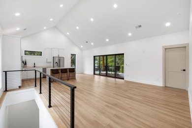 This new construction modern lake home is so fresh the walls - photo 4
