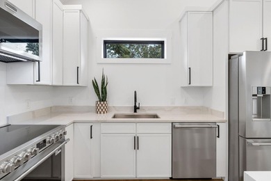 This new construction modern lake home is so fresh the walls - photo 7