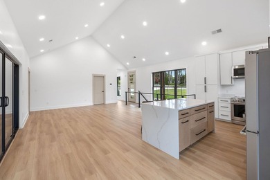 This new construction modern lake home is so fresh the walls - photo 8