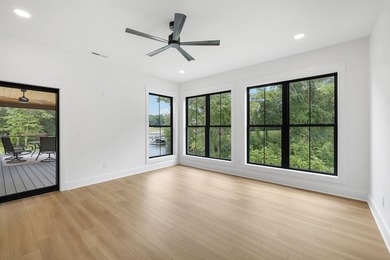 This new construction modern lake home is so fresh the walls - photo 9
