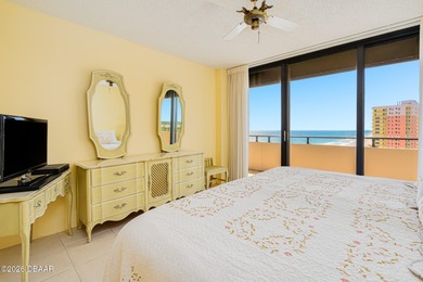 Perched high above the shoreline, this exceptional 12th-floor