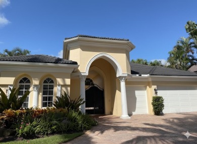 Lake Home For Sale in Palm Beach Gardens, Florida