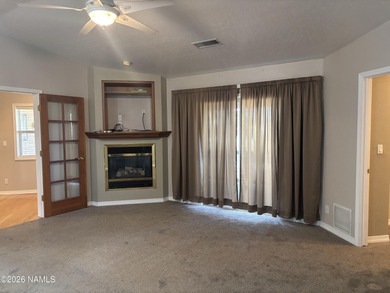 Fantastic golf course location home. Cedar siding and rock